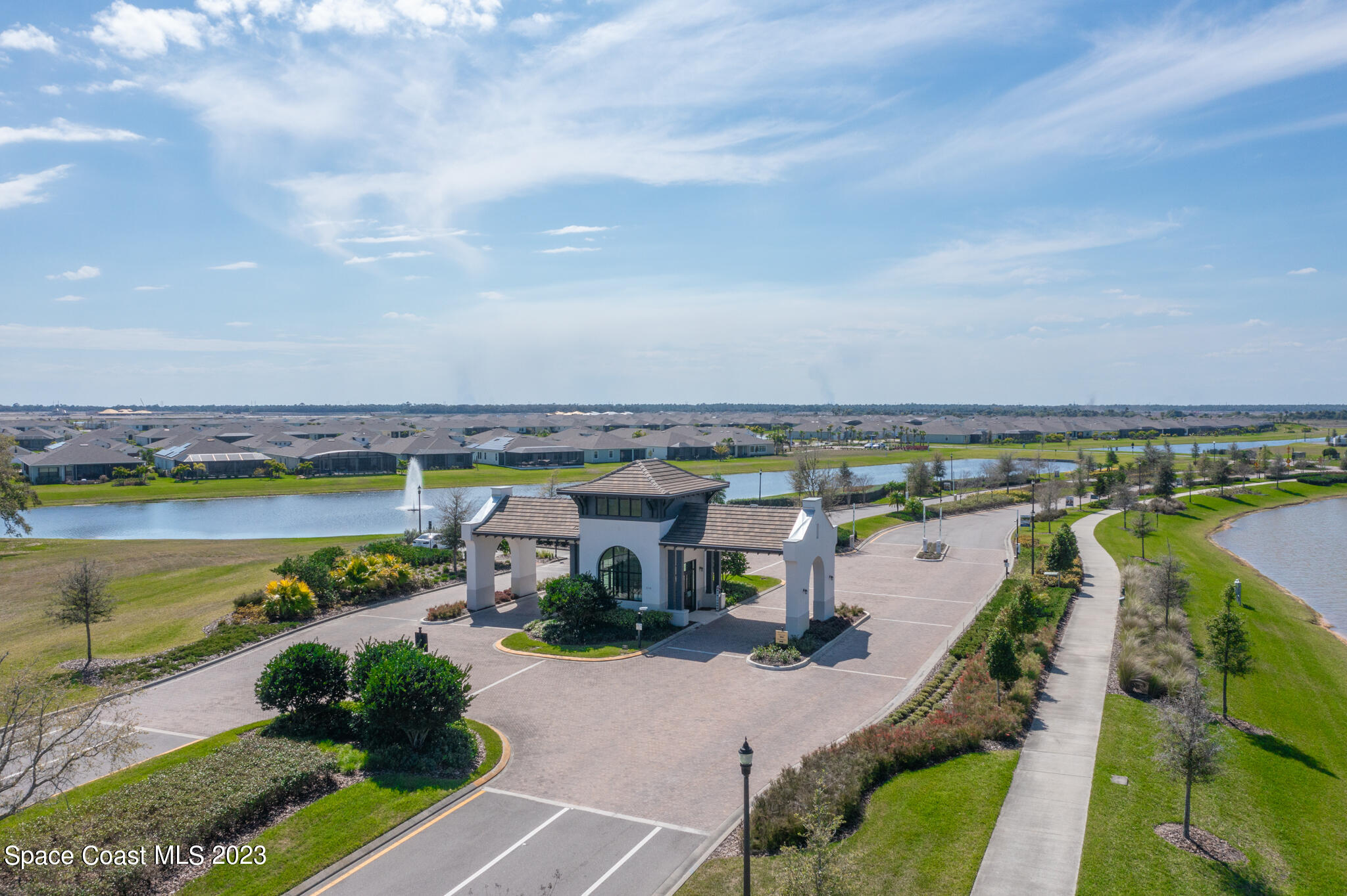 9753 Alister Drive Melbourne, FL 32940 - Photo 37 of 42 a view of a city with lawn chairs
