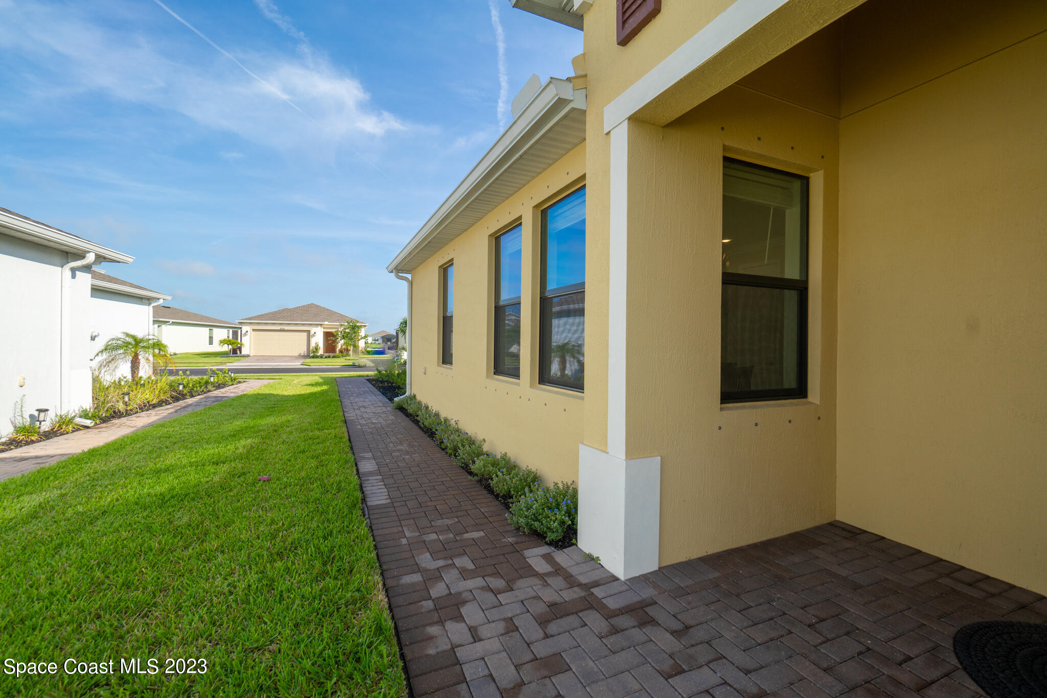9753 Alister Drive Melbourne, FL 32940 - Photo 6 of 42 a view of an entrance to house