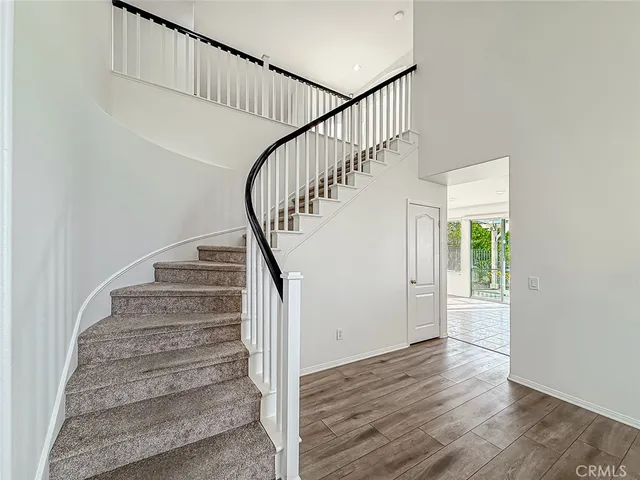 a view of empty room with windows