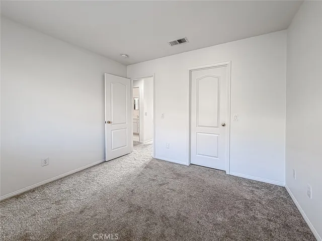 a front view of house with yard and outdoor seating