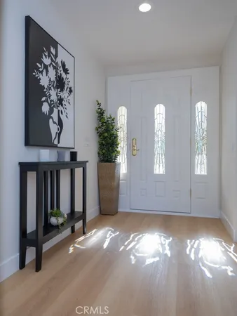 a workspace with furniture window and wooden floor