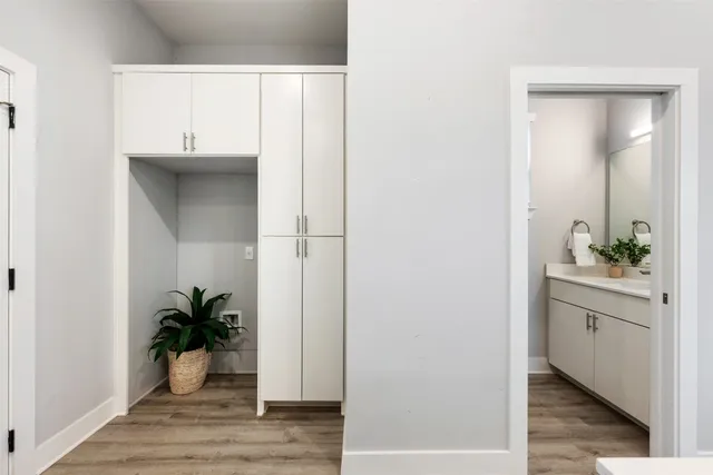 a view of entryway with wooden floor