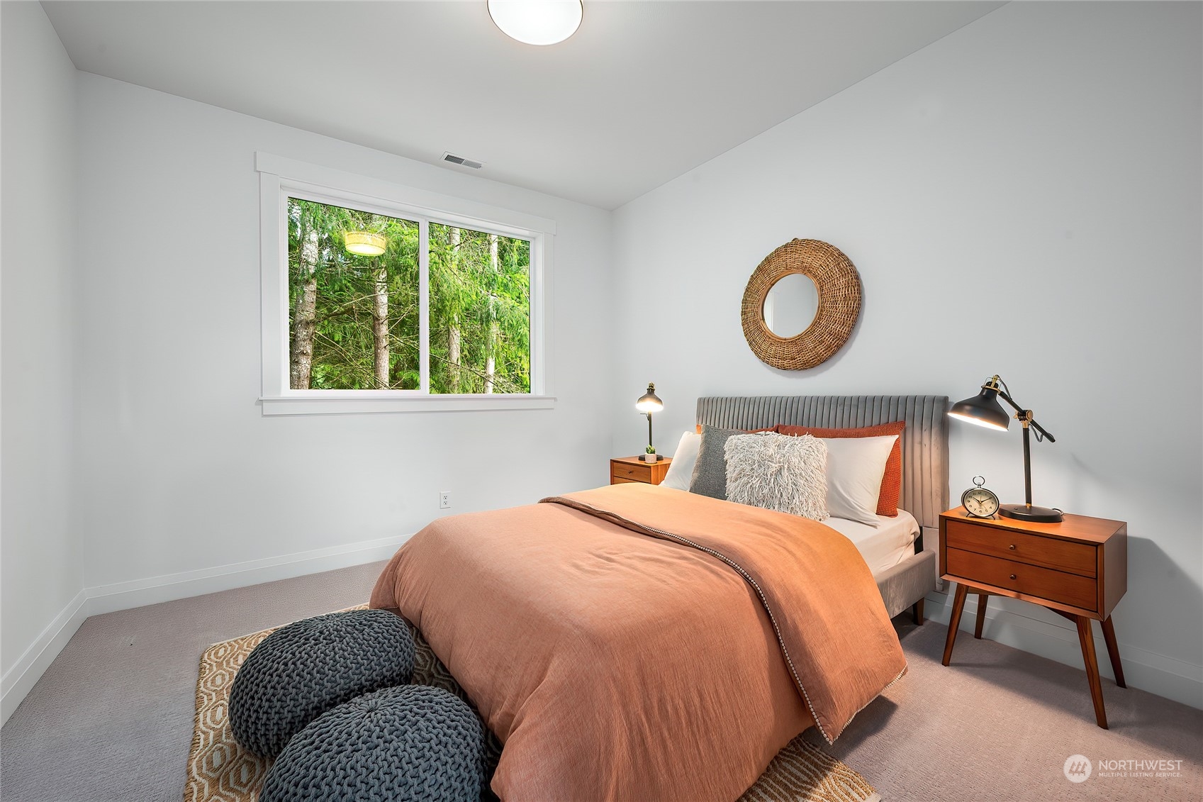 309 174th Street Southeast Bothell, WA 98012 - Photo 15 of 35 a bedroom with a bed and a window