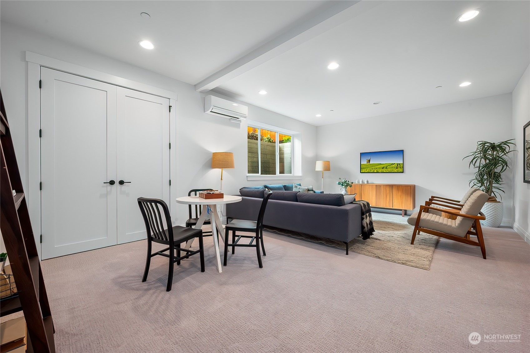 309 174th Street Southeast Bothell, WA 98012 - Photo 17 of 35 a living room with furniture and a potted plant