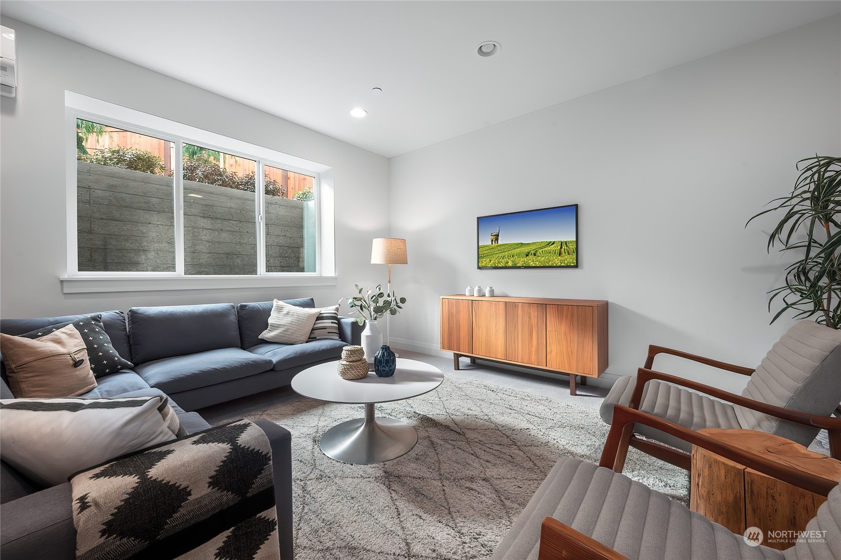 309 174th Street Southeast Bothell, WA 98012 - Photo 18 of 35 a living room with furniture and a window