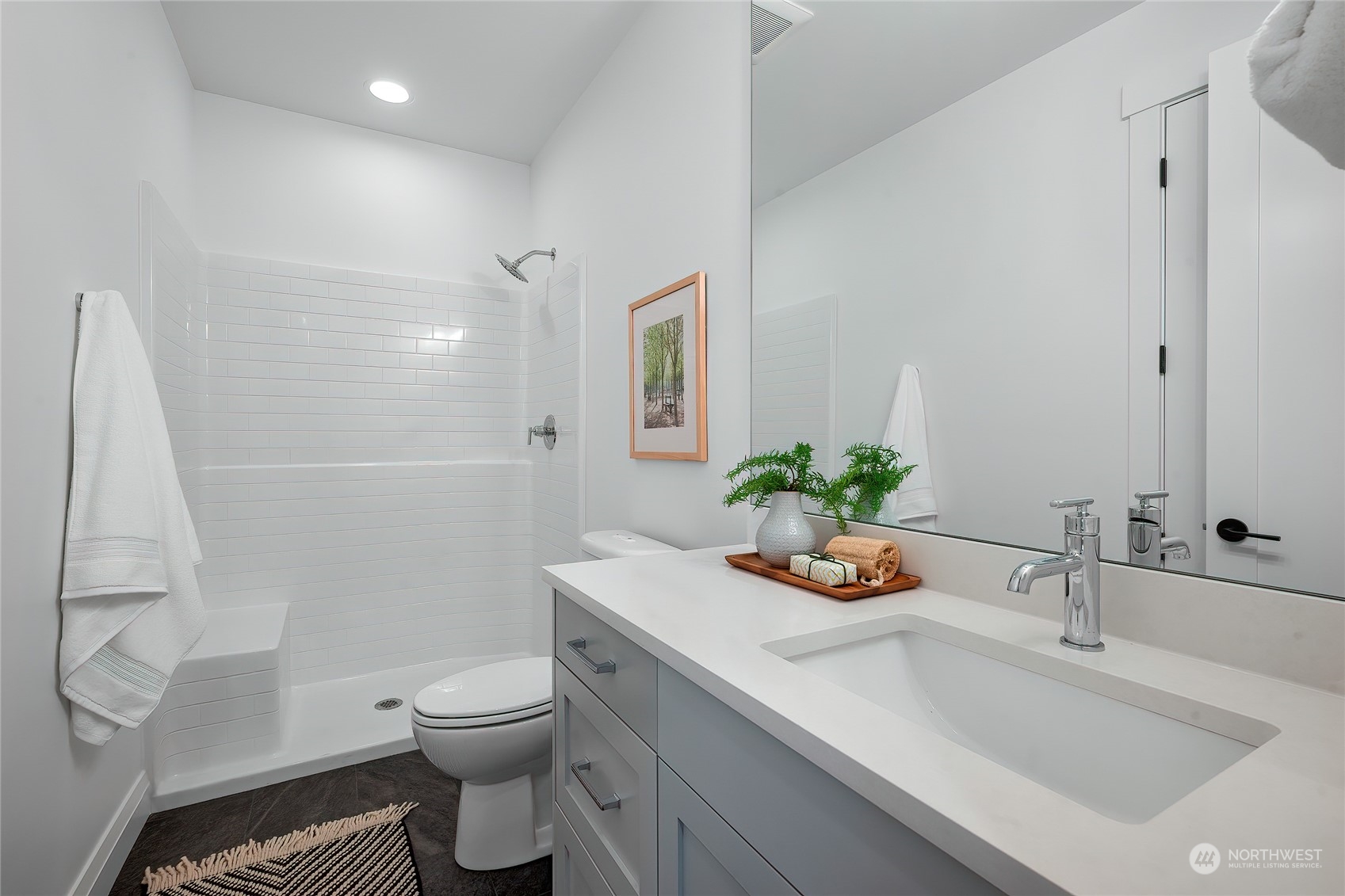 309 174th Street Southeast Bothell, WA 98012 - Photo 20 of 35 a bathroom with a sink a toilet and shower