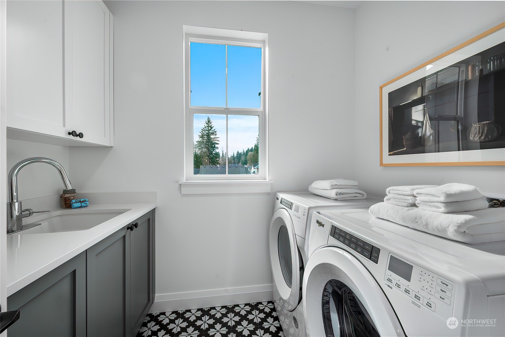 309 174th Street Southeast Bothell, WA 98012 - Photo 23 of 35 a utility room with sink dryer and washer