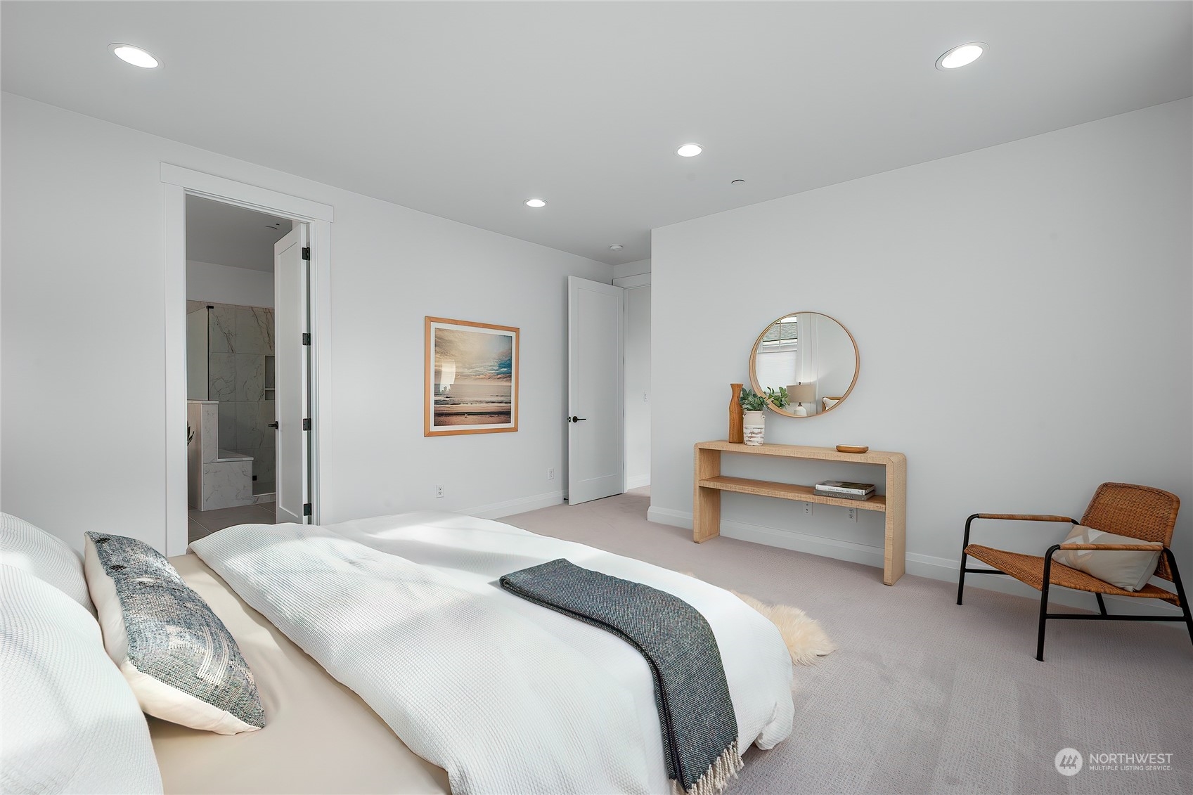 309 174th Street Southeast Bothell, WA 98012 - Photo 25 of 35 a bedroom with a bed and dresser with mirror