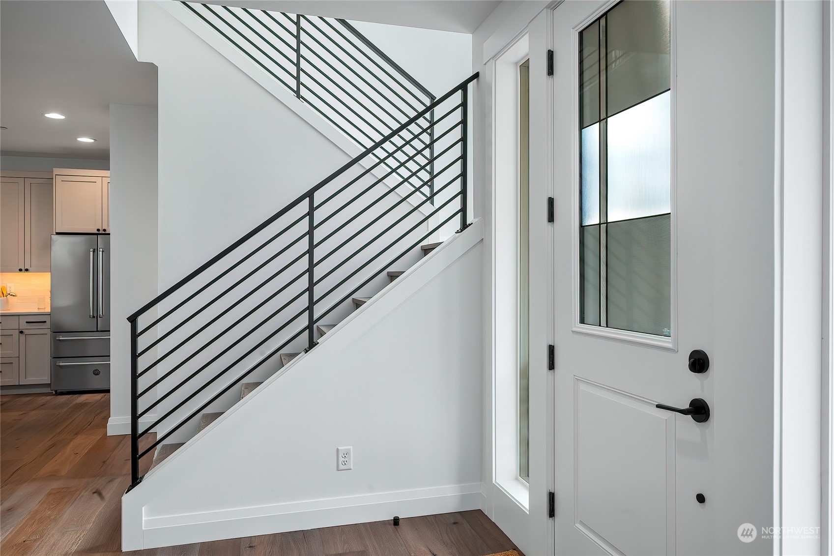 309 174th Street Southeast Bothell, WA 98012 - Photo 3 of 35 a view of entryway with wooden floor