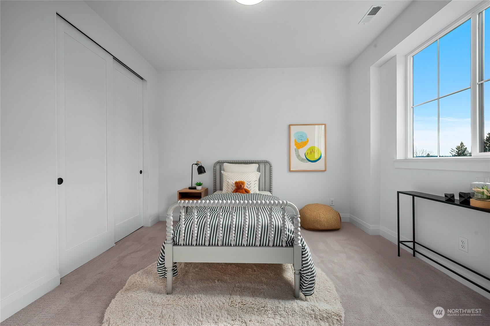 309 174th Street Southeast Bothell, WA 98012 - Photo 32 of 35 a bedroom with a bed and a desk