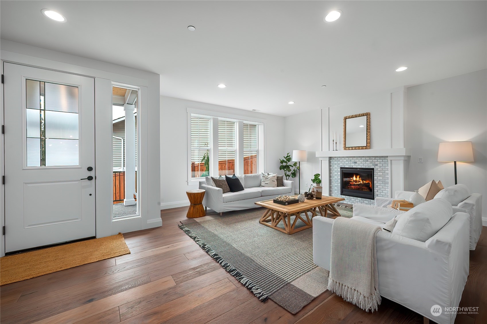 309 174th Street Southeast Bothell, WA 98012 - Photo 5 of 35 a living room with furniture and a fireplace