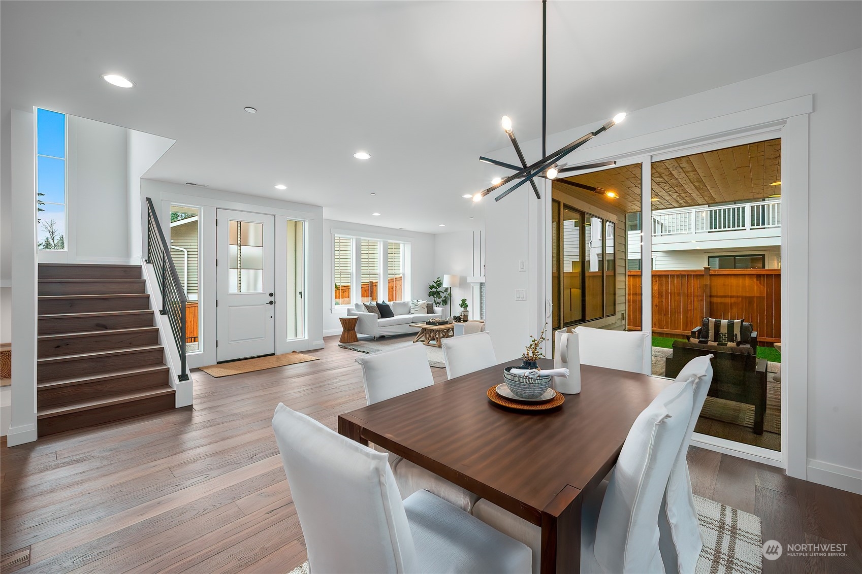 309 174th Street Southeast Bothell, WA 98012 - Photo 8 of 35 a dining room with furniture and wooden floor