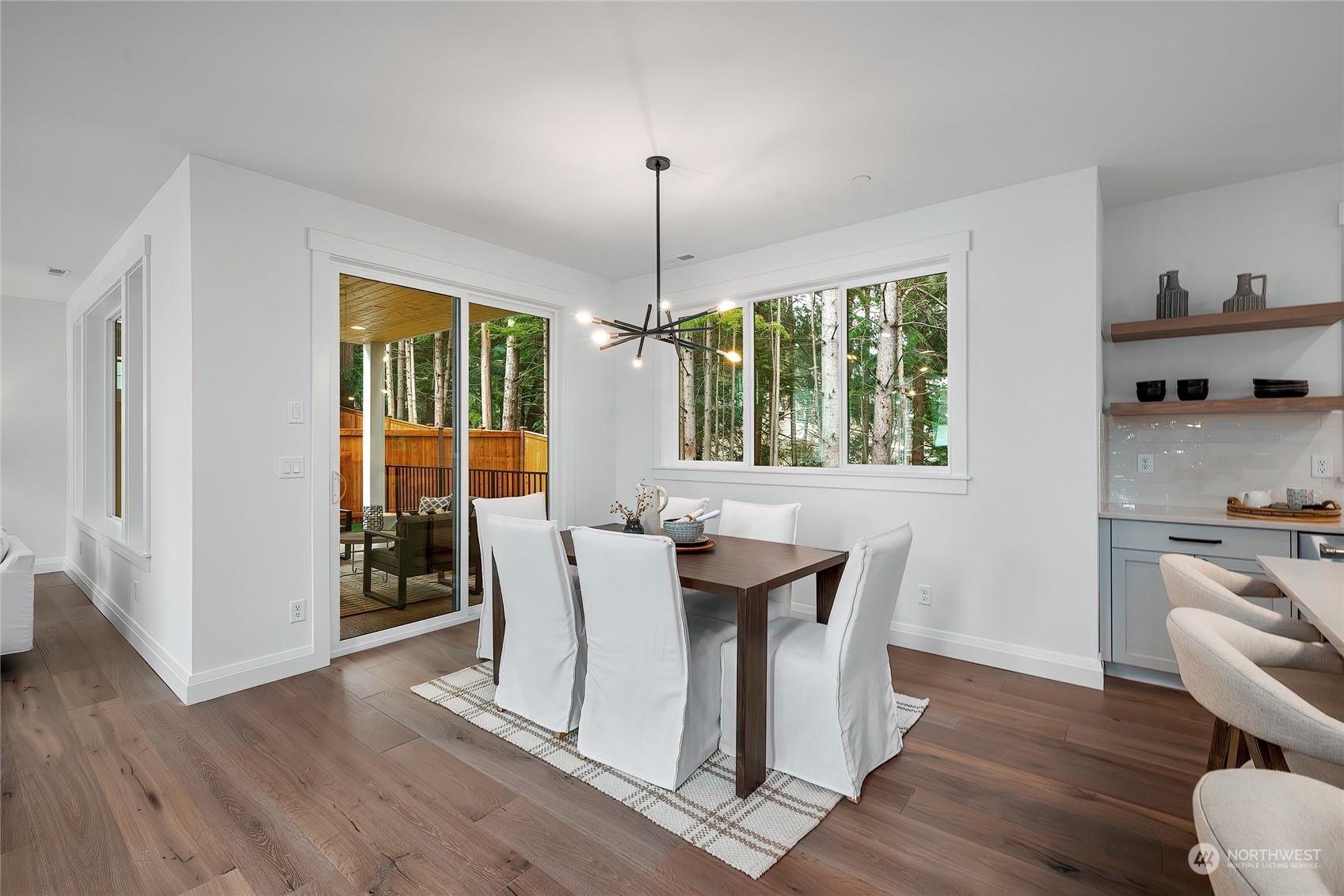 309 174th Street Southeast Bothell, WA 98012 - Photo 9 of 35 a dining room with furniture window wooden floor