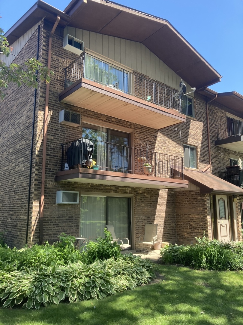 front view of a house with a swimming pool