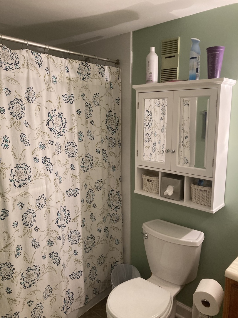 2461 Spring Street, Unit 3504 Woodridge, IL 60517 - Photo 16 of 20 a white toilet sitting next to a bathroom sink
