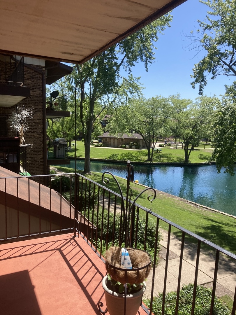2461 Spring Street, Unit 3504 Woodridge, IL 60517 - Photo 18 of 20 a view of a balcony with lake view