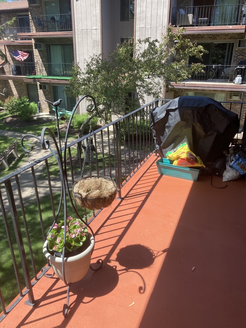 2461 Spring Street, Unit 3504 Woodridge, IL 60517 - Photo 20 of 20 a view of swimming pool with outdoor seating and plants