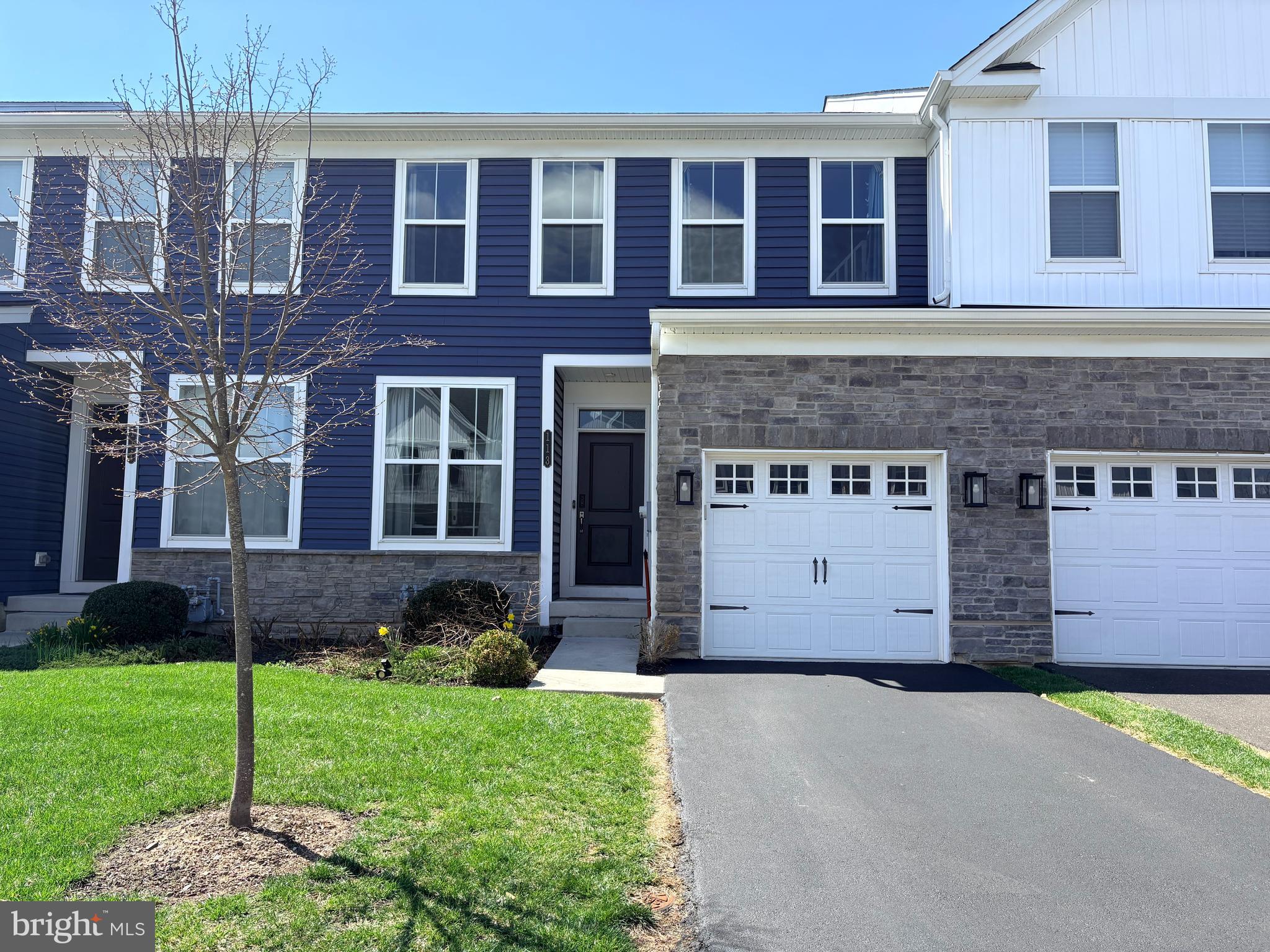 113 Wynstone Court Colmar, PA 18915 - Photo 1 of 20 a front view of a house with garden