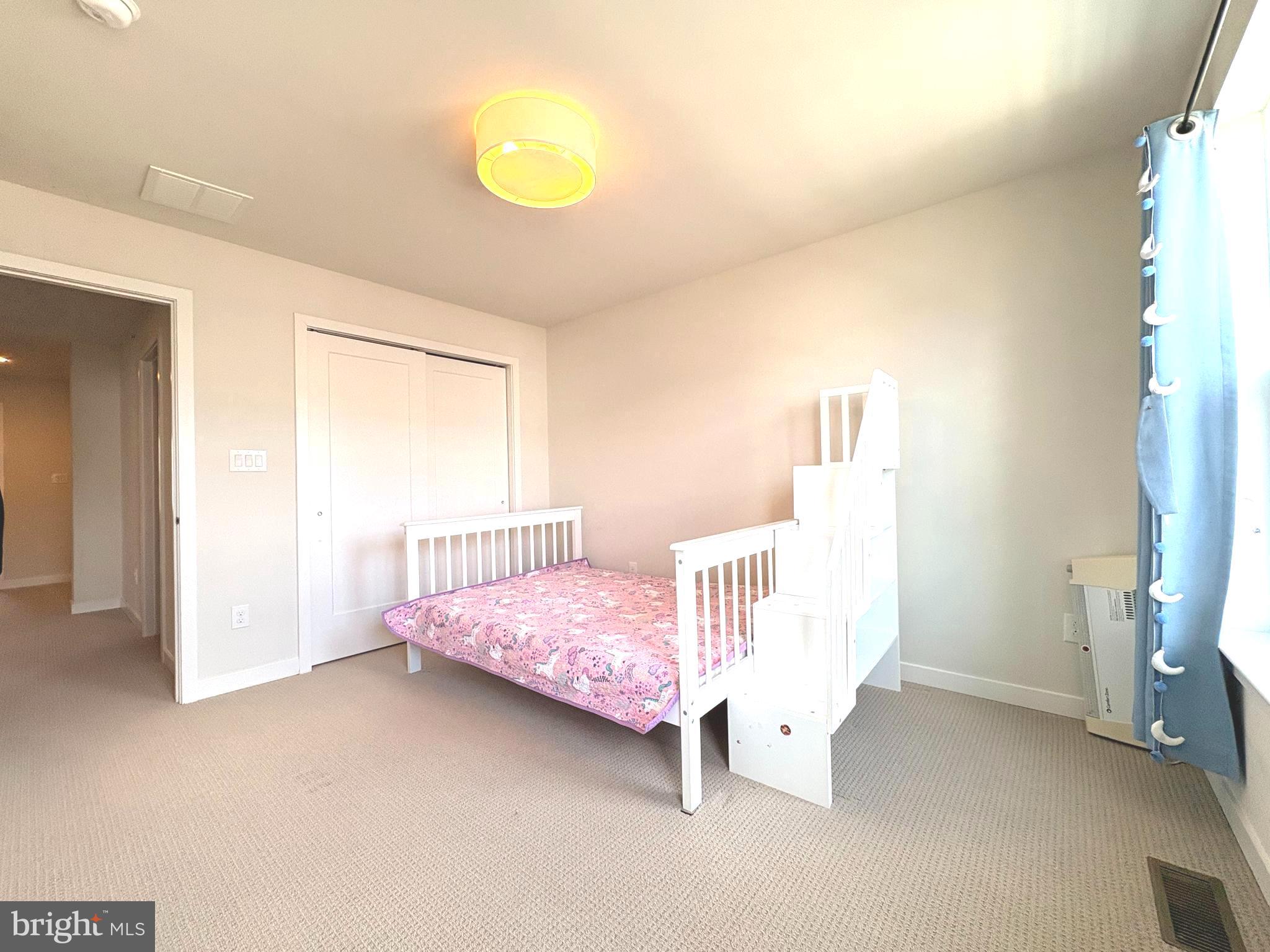 113 Wynstone Court Colmar, PA 18915 - Photo 17 of 20 a bedroom with a bed and a window