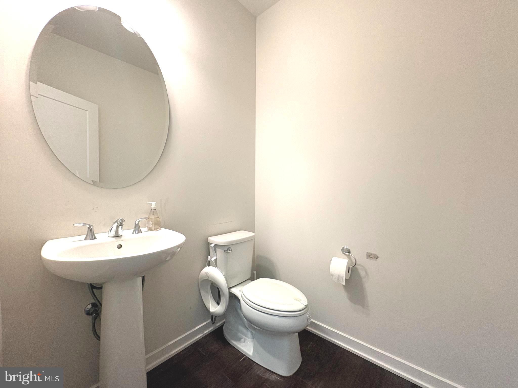 113 Wynstone Court Colmar, PA 18915 - Photo 7 of 20 a bathroom with a sink toilet and a mirror