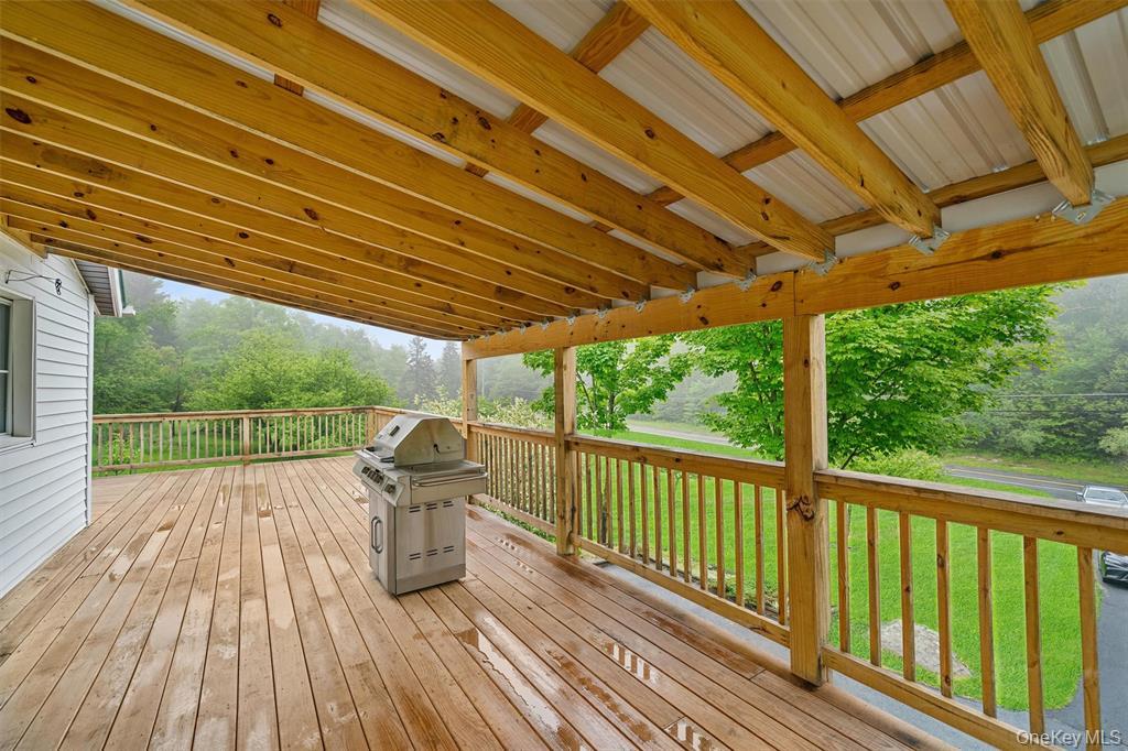 1013 Cooley Road Parksville, NY 12768 - Photo 29 of 44 a view of a wooden deck