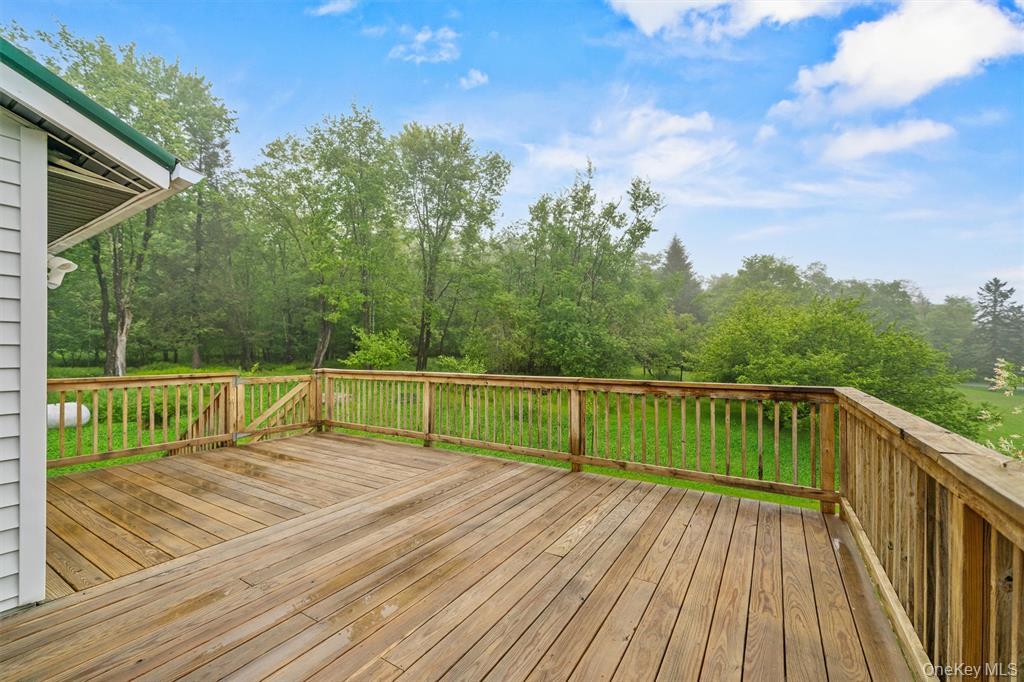 1013 Cooley Road Parksville, NY 12768 - Photo 30 of 44 a view of a balcony with wooden floor