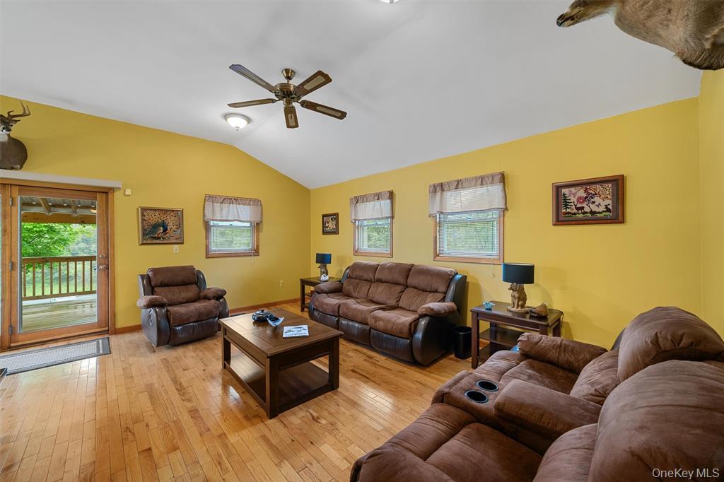 1013 Cooley Road Parksville, NY 12768 - Photo 7 of 44 a living room with furniture and a window