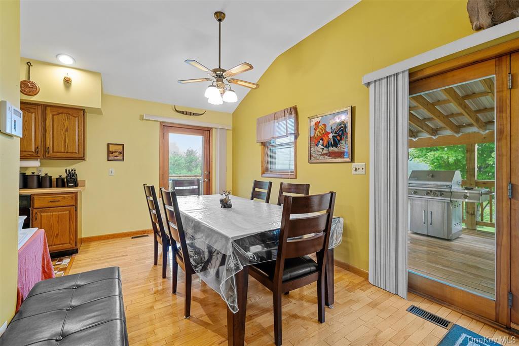 1013 Cooley Road Parksville, NY 12768 - Photo 10 of 44 a view of a dining room with furniture window and outside view