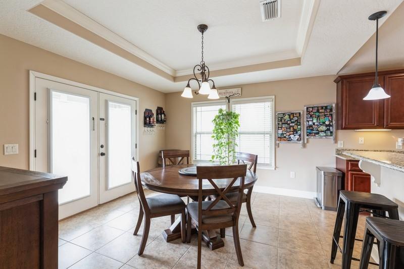 2693 Hartman Court Navarre, FL 32566 - Photo 15 of 34 a dining room with furniture and window