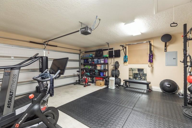 2693 Hartman Court Navarre, FL 32566 - Photo 17 of 34 a view of a room with gym equipment