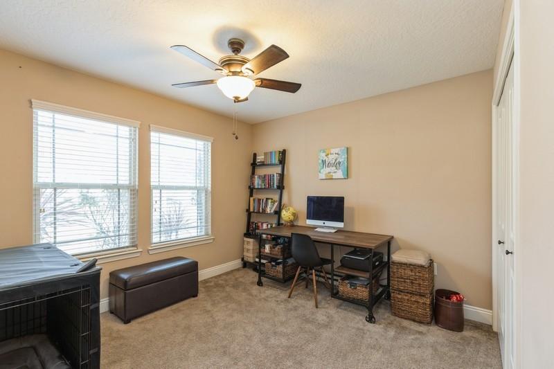 2693 Hartman Court Navarre, FL 32566 - Photo 26 of 34 a view of a workspace with furniture and a window