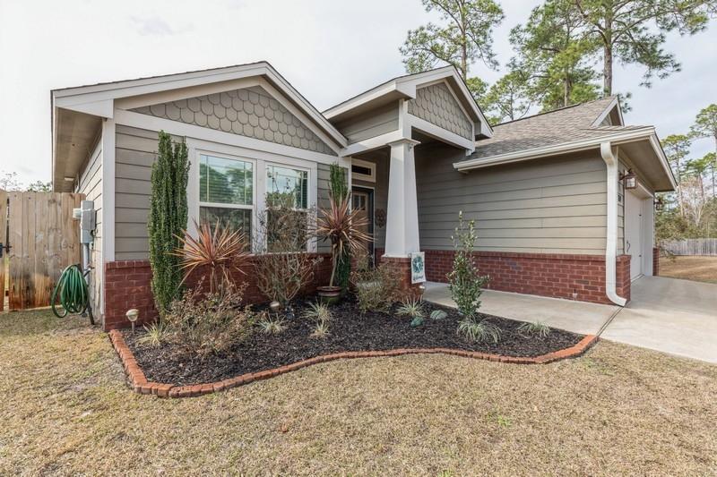 2693 Hartman Court Navarre, FL 32566 - Photo 3 of 34 a view of a house with backyard