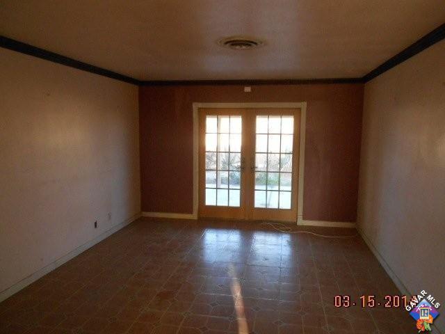 300 Traci Lane Ridgecrest, CA 93555 - Photo 5 of 7 a view of an empty room with a window