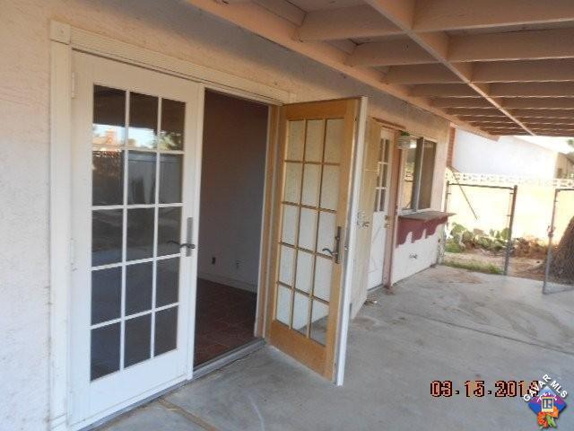 300 Traci Lane Ridgecrest, CA 93555 - Photo 7 of 7 a view of an empty room with a window