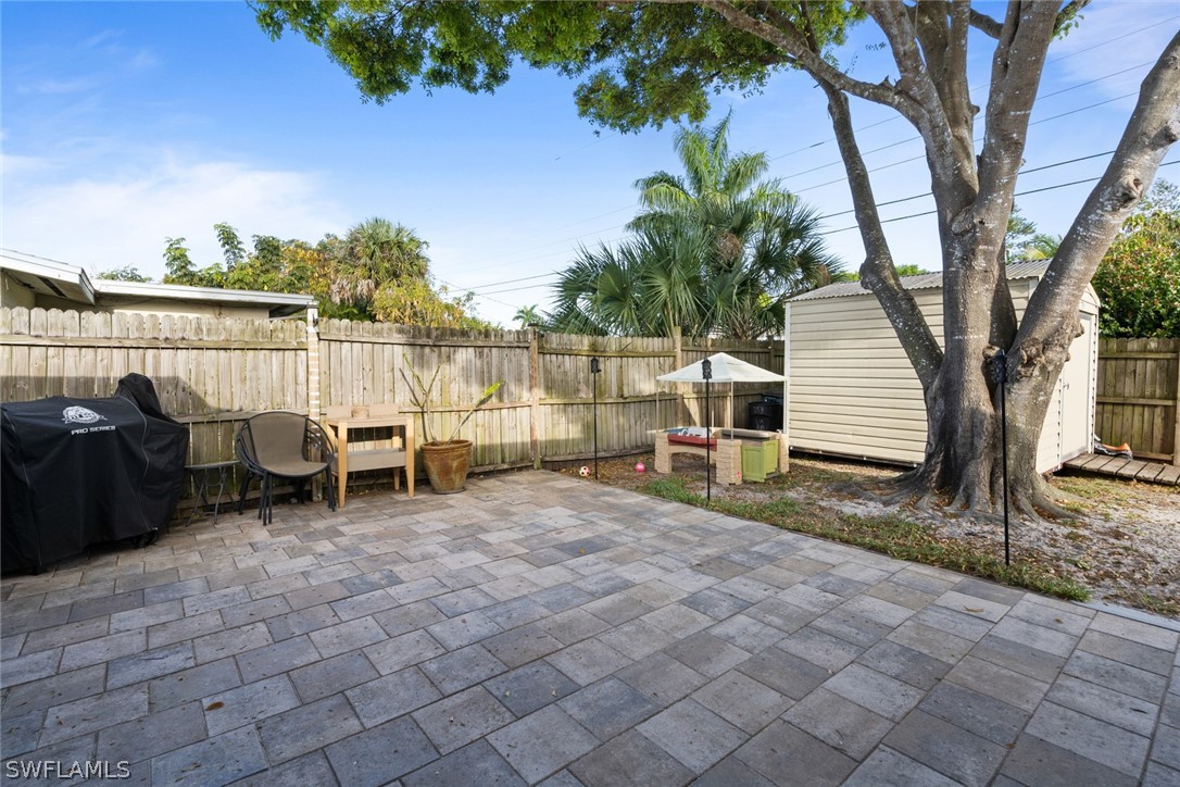 1447 Collins Road Fort Myers, FL 33919 - Photo 33 of 34 a view of a terrace with a bench