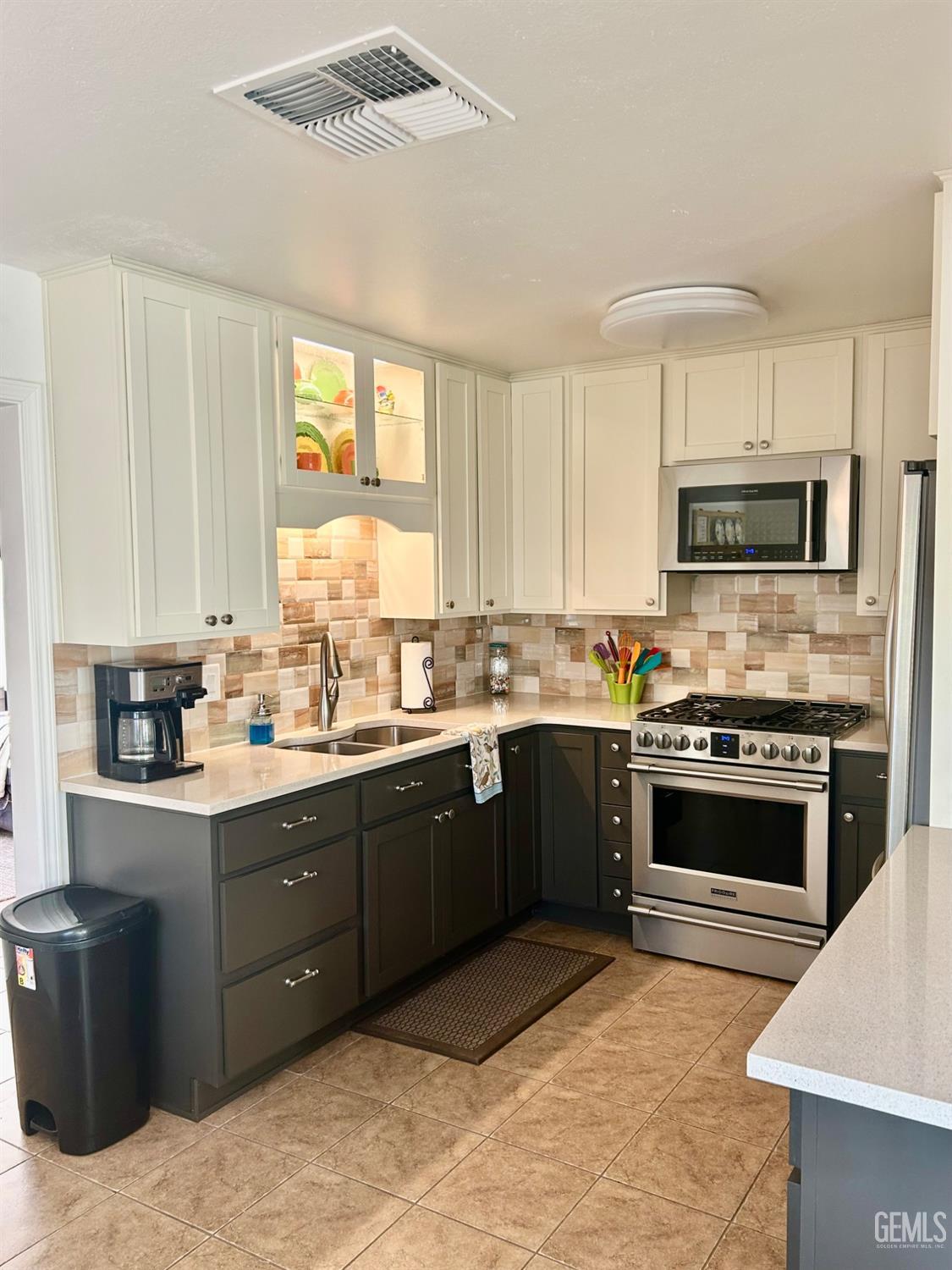 Undisclosed Address Posey, CA 93260 - Photo 6 of 39 a large kitchen with stainless steel appliances granite countertop a stove granite counter tops and a window