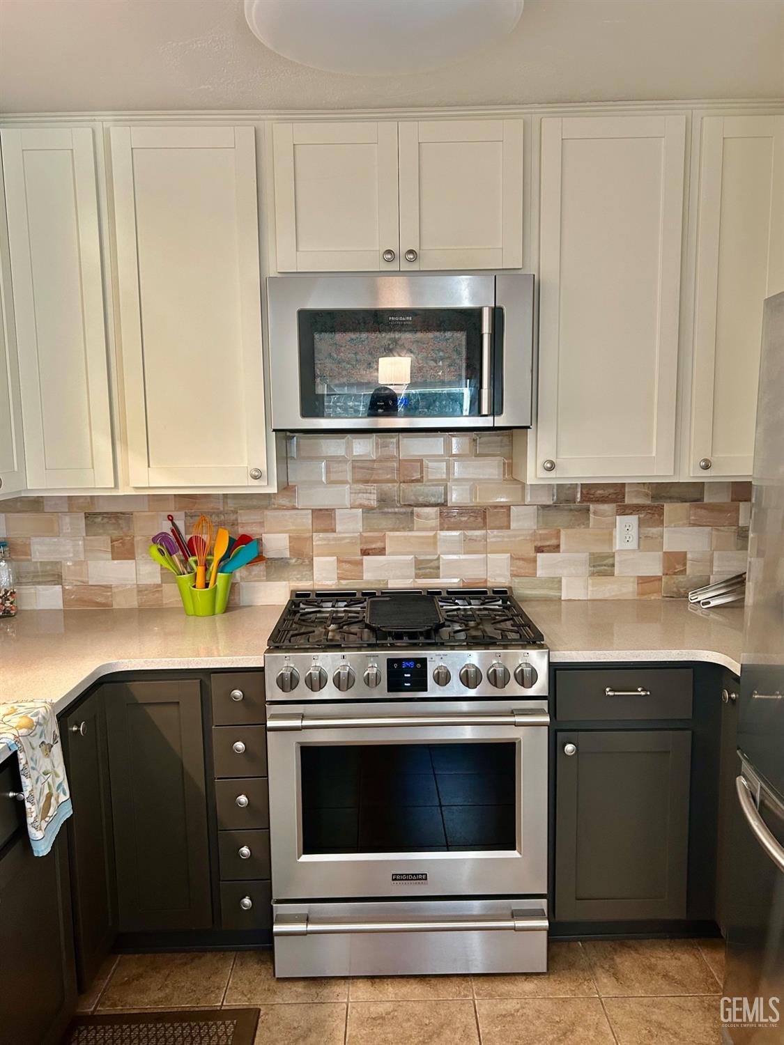 Undisclosed Address Posey, CA 93260 - Photo 8 of 39 a kitchen with granite countertop white cabinets and stainless steel appliances