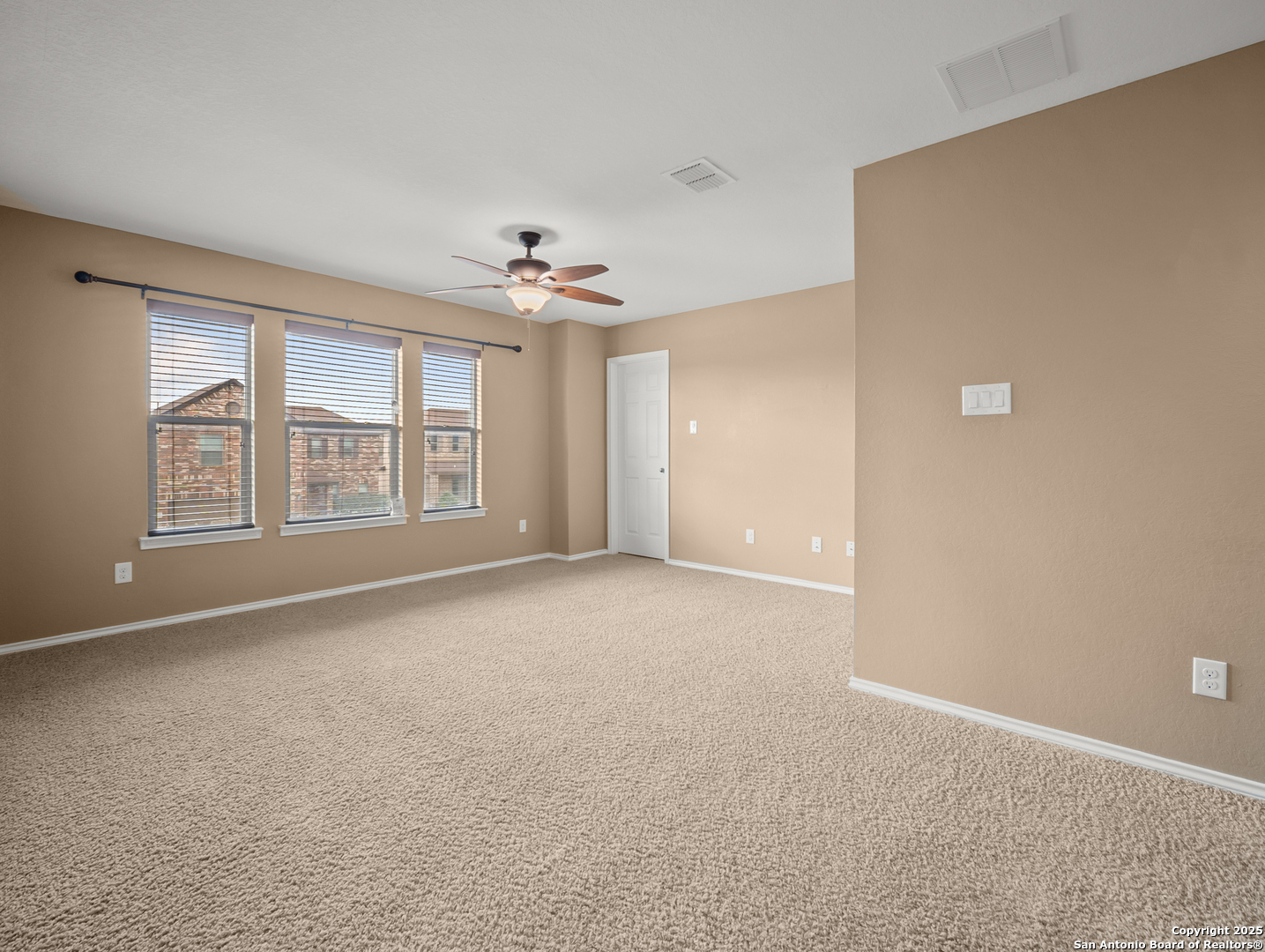 7514 Copper Cove Converse, TX 78109 - Photo 27 of 33 a view of an empty room with windows