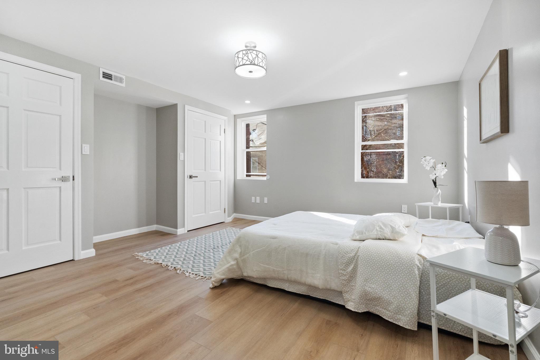 1203 Moore Street Philadelphia, PA 19148 - Photo 16 of 41 a bedroom with a bed and a window