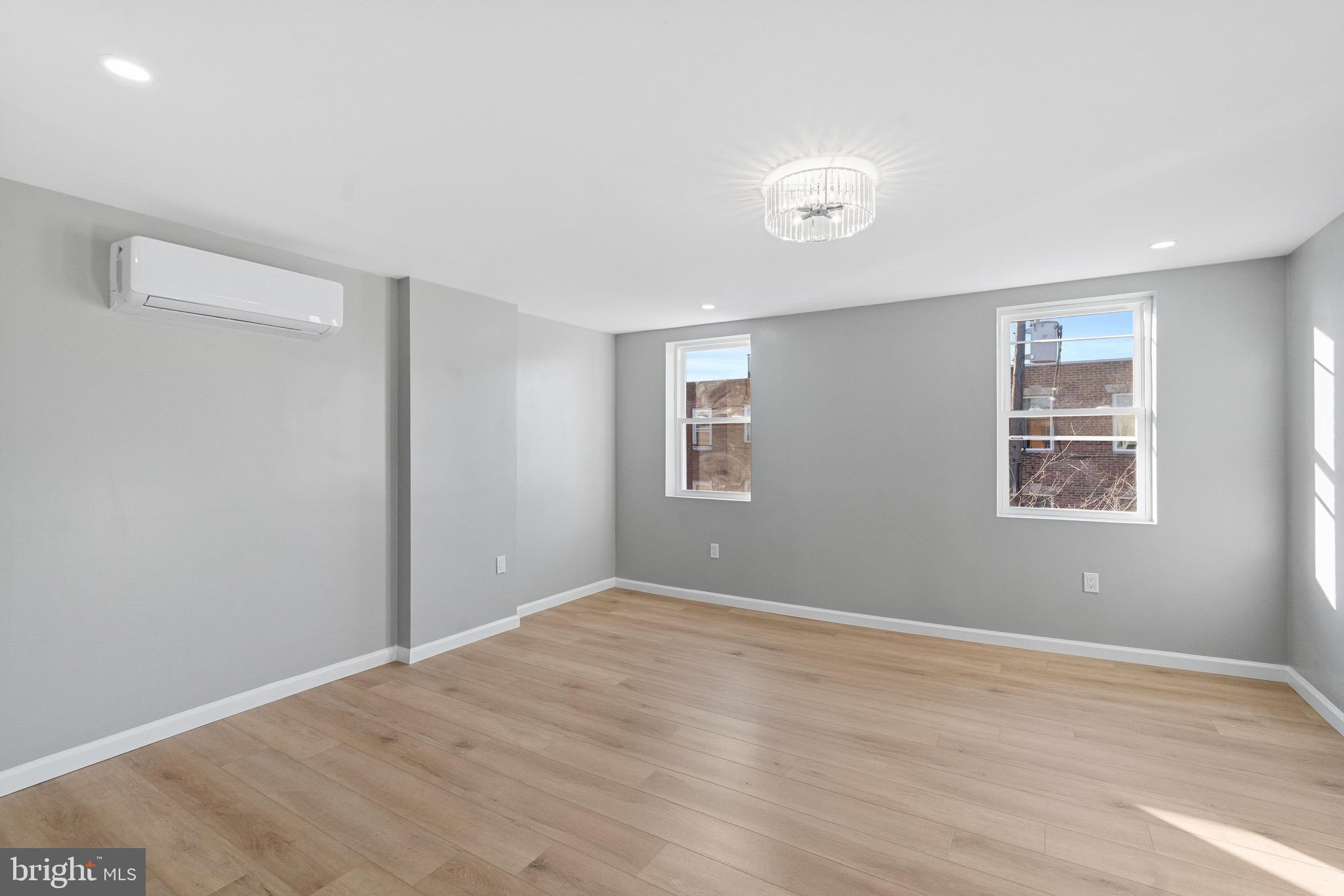 1203 Moore Street Philadelphia, PA 19148 - Photo 18 of 41 a view of an empty room with a window