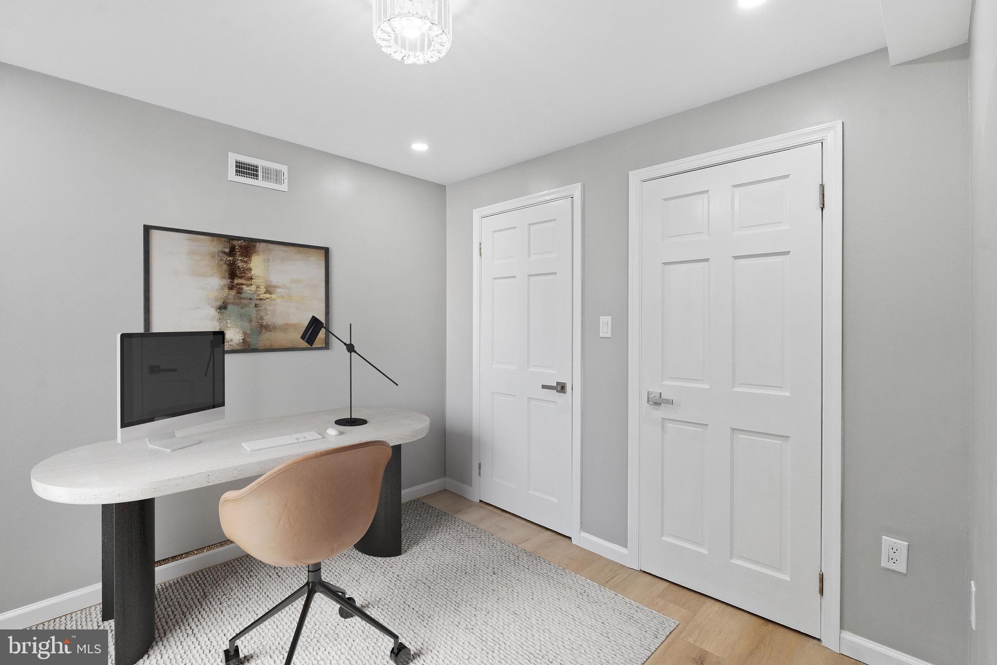 1203 Moore Street Philadelphia, PA 19148 - Photo 23 of 41 a workspace with furniture and window