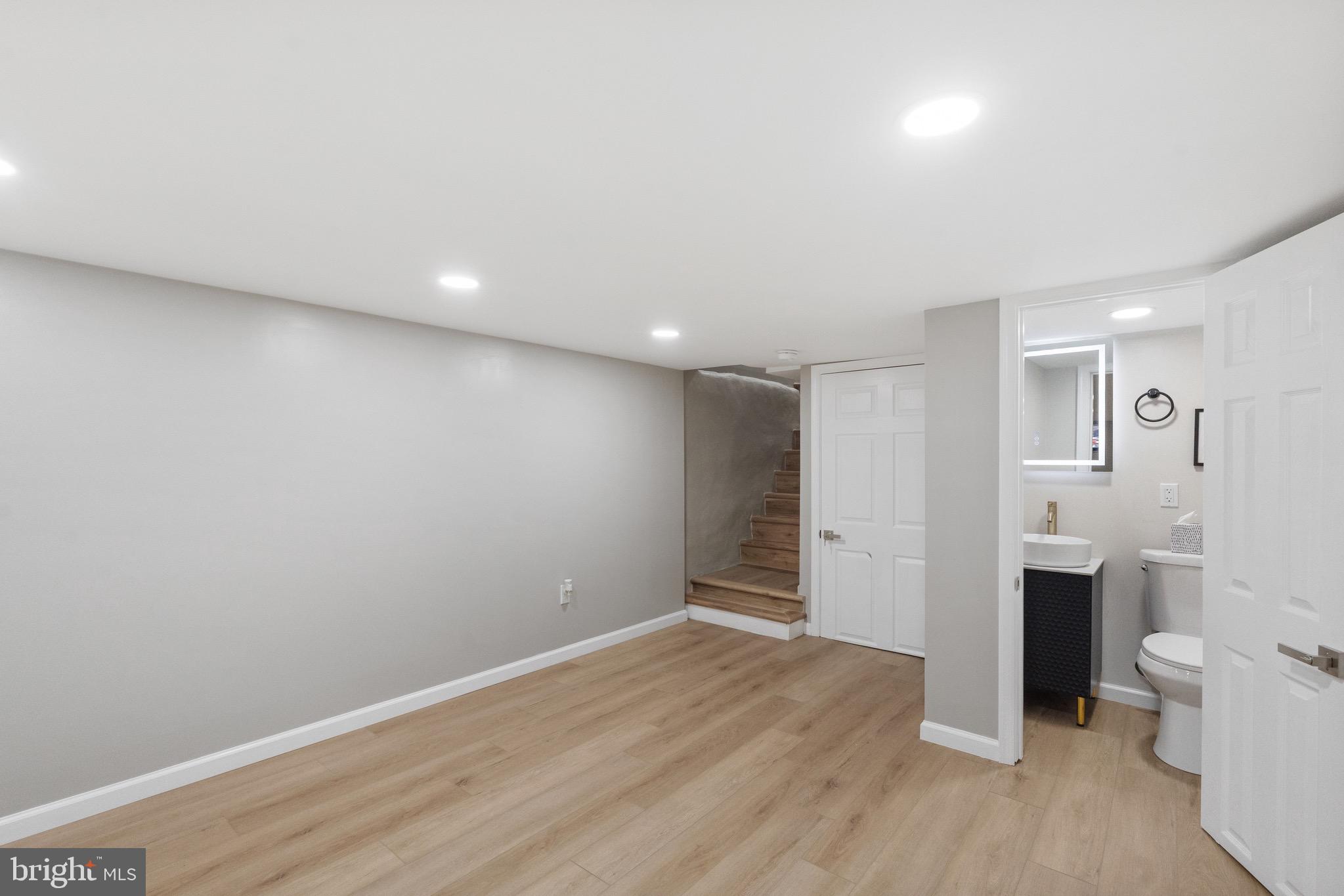 1203 Moore Street Philadelphia, PA 19148 - Photo 24 of 41 a view of an empty room with a fireplace