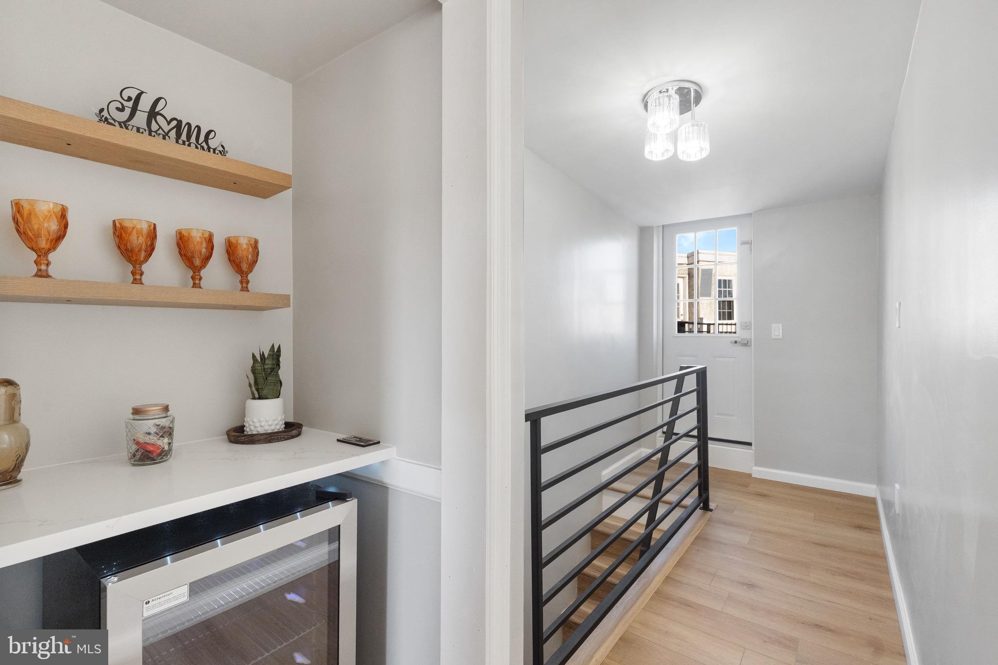 1203 Moore Street Philadelphia, PA 19148 - Photo 28 of 41 a view of hallway with baby crib and livingroom