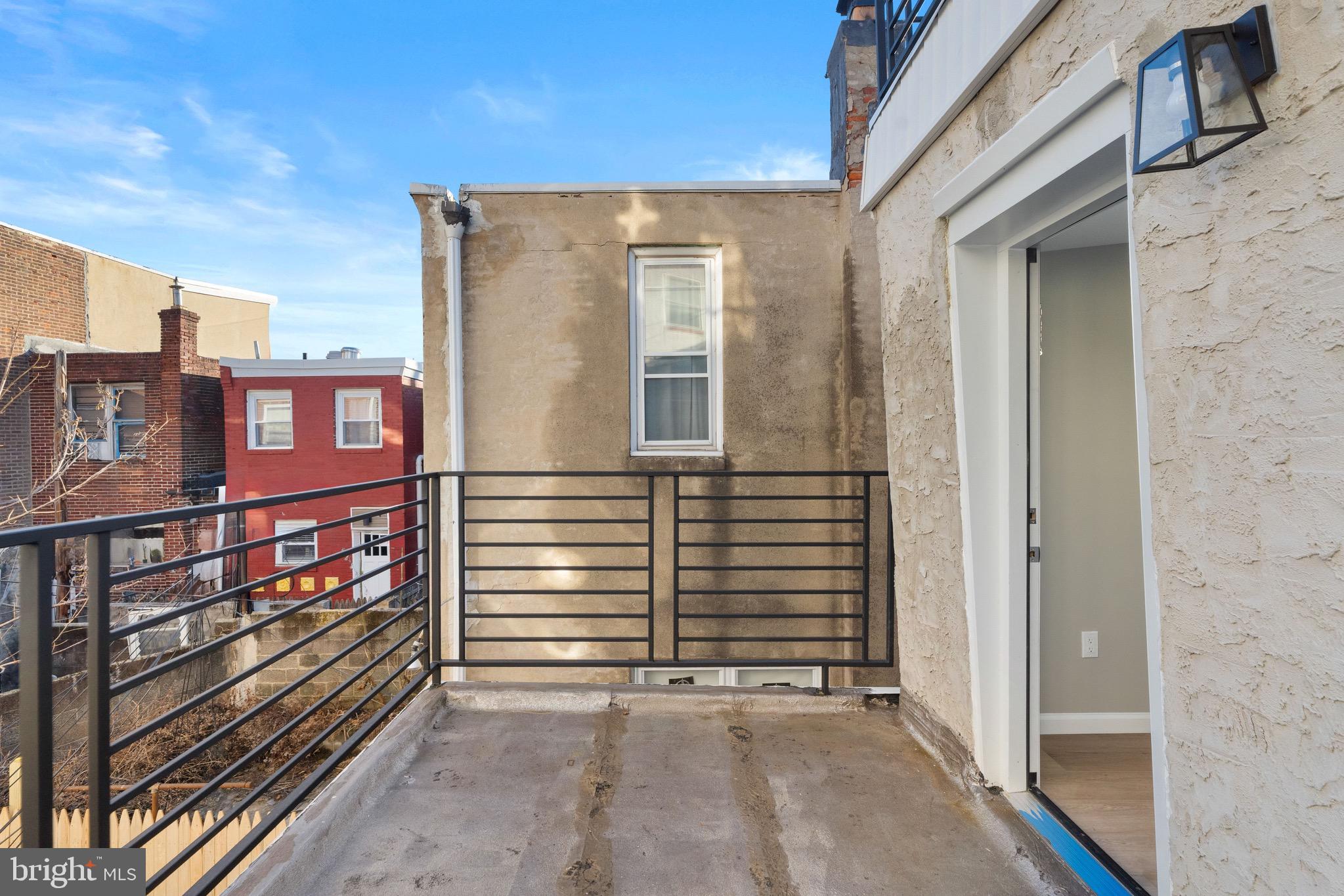 1203 Moore Street Philadelphia, PA 19148 - Photo 30 of 41 a view of a building from a balcony