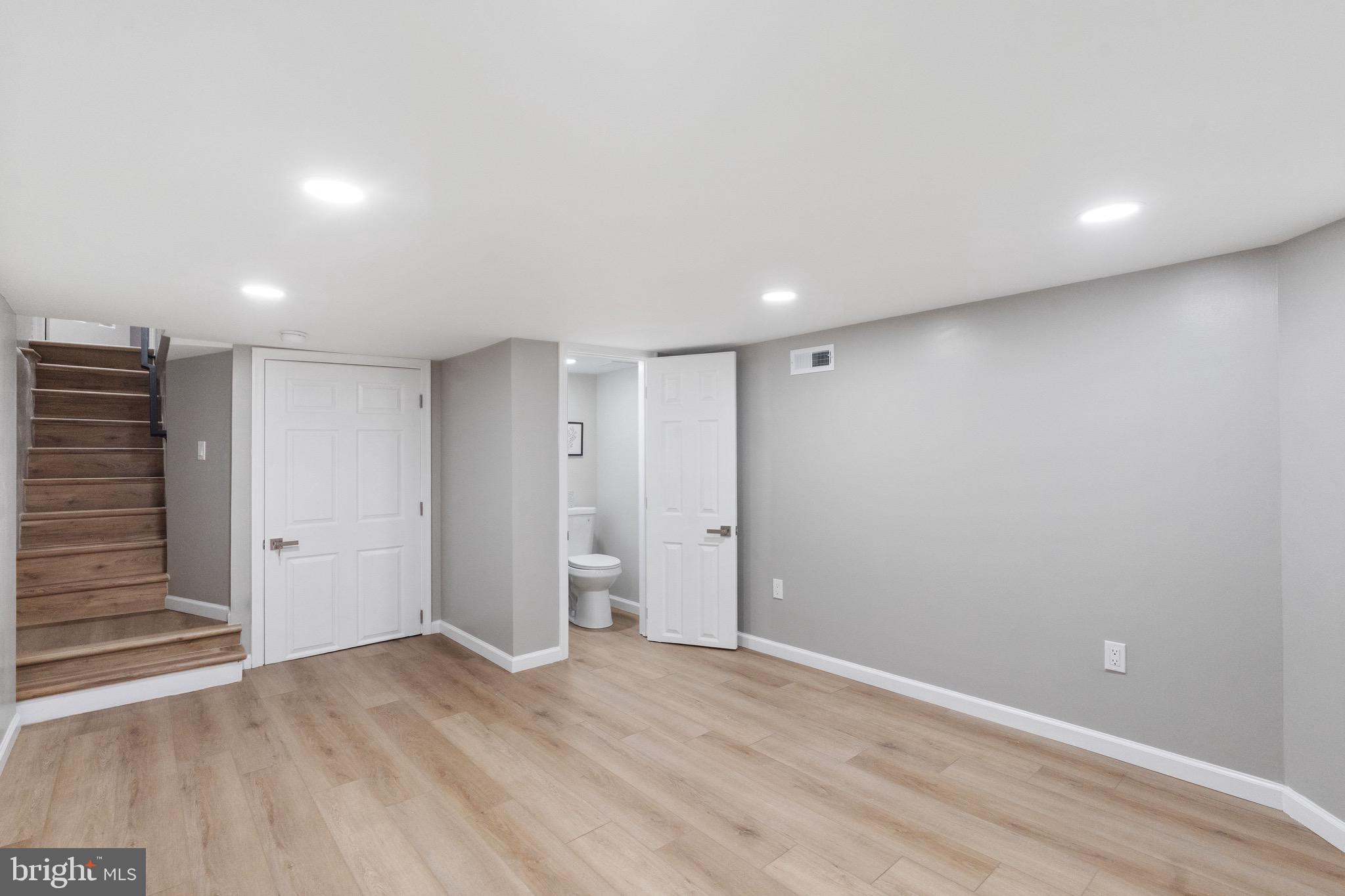 1203 Moore Street Philadelphia, PA 19148 - Photo 40 of 41 a view of wooden floor and windows in a room