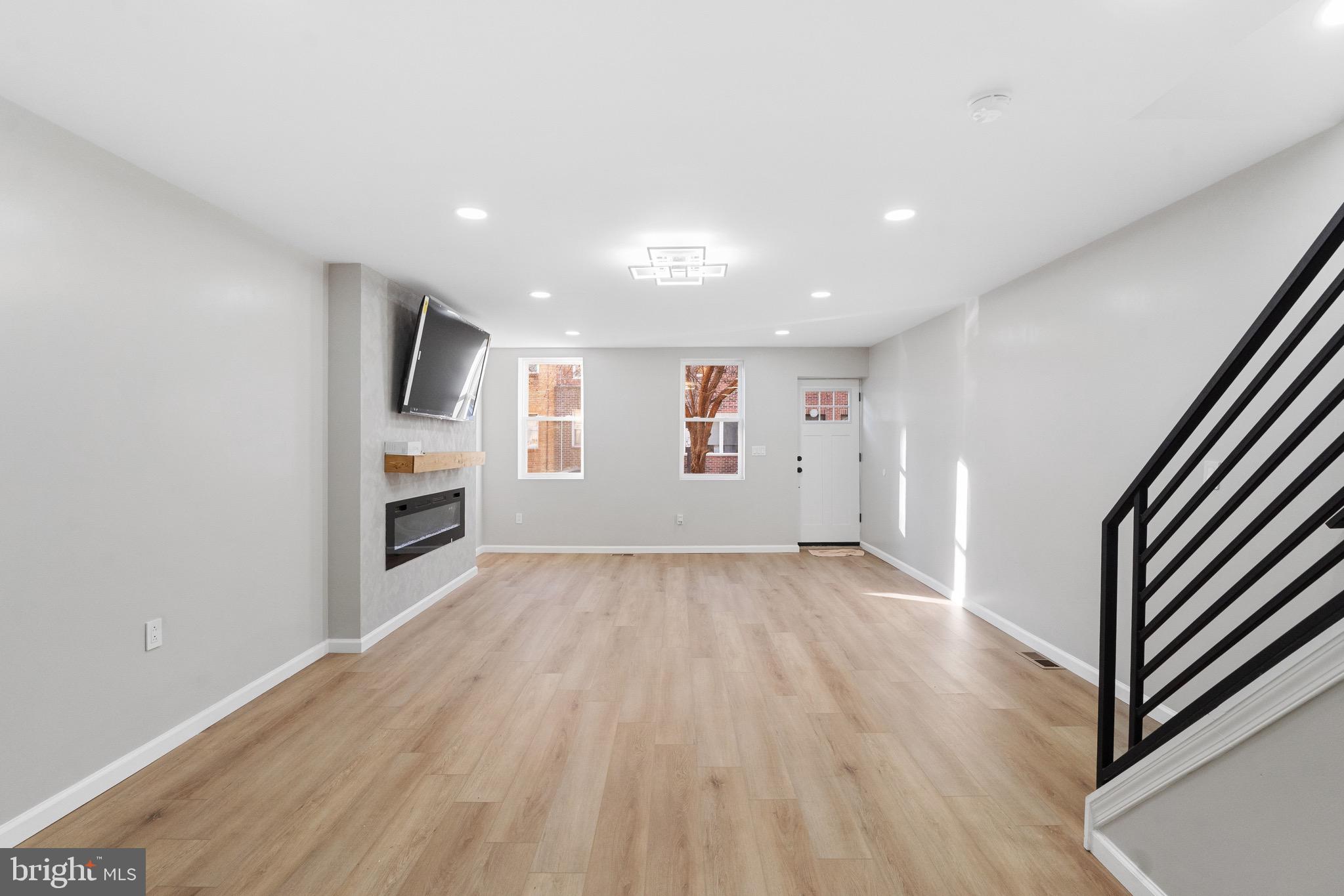 1203 Moore Street Philadelphia, PA 19148 - Photo 10 of 41 an empty room with wooden floor and window