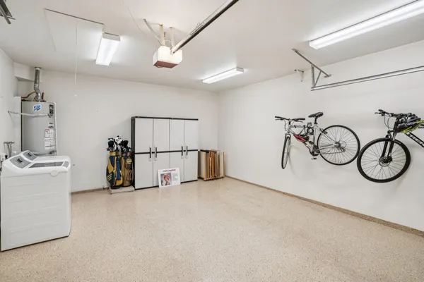 a view of empty room with white walls
