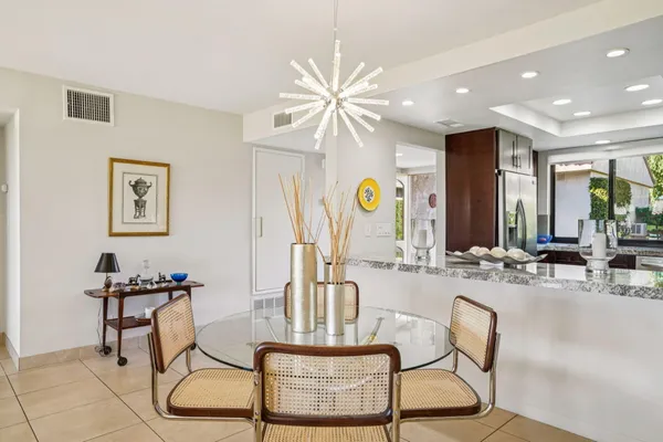 a view of a dining room with furniture