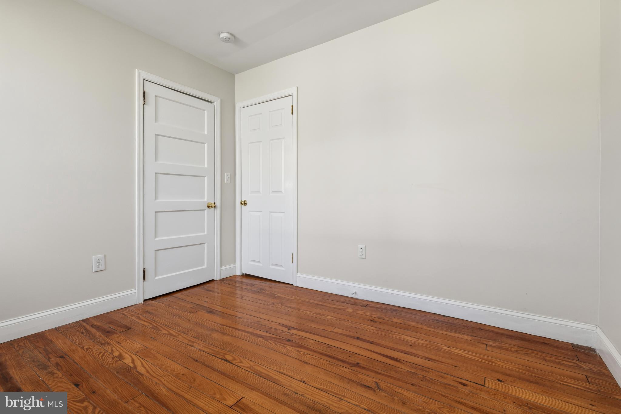 229 Wayne Avenue Narberth, PA 19072 - Photo 24 of 35 a view of an empty room with wooden floor