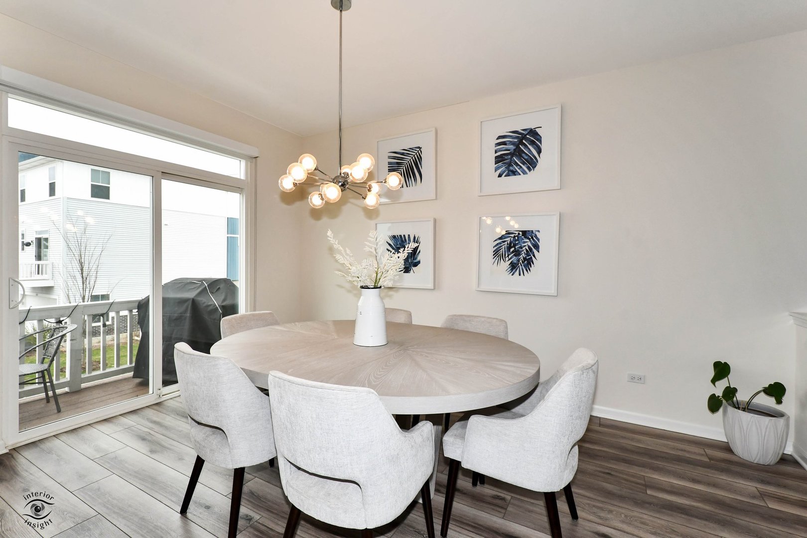 4154 Irving Road Aurora, IL 60504 - Photo 11 of 25 a view of a dining room with furniture wooden floor and chandelier